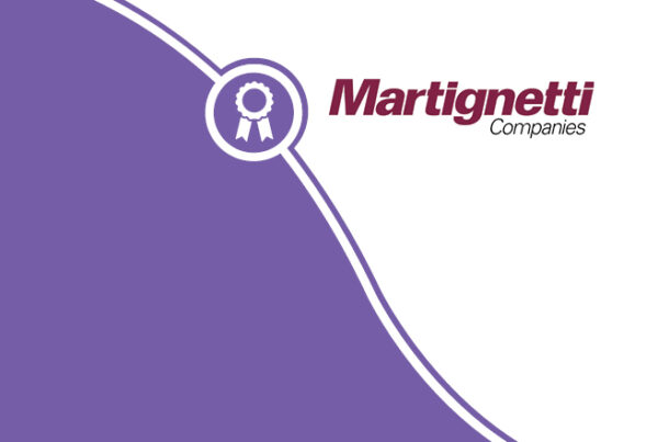 en lilla og hvit logo for martignetti-selskaper
