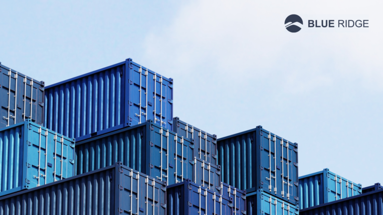 warehouse buildings representing global supply chain risk & uncertainly